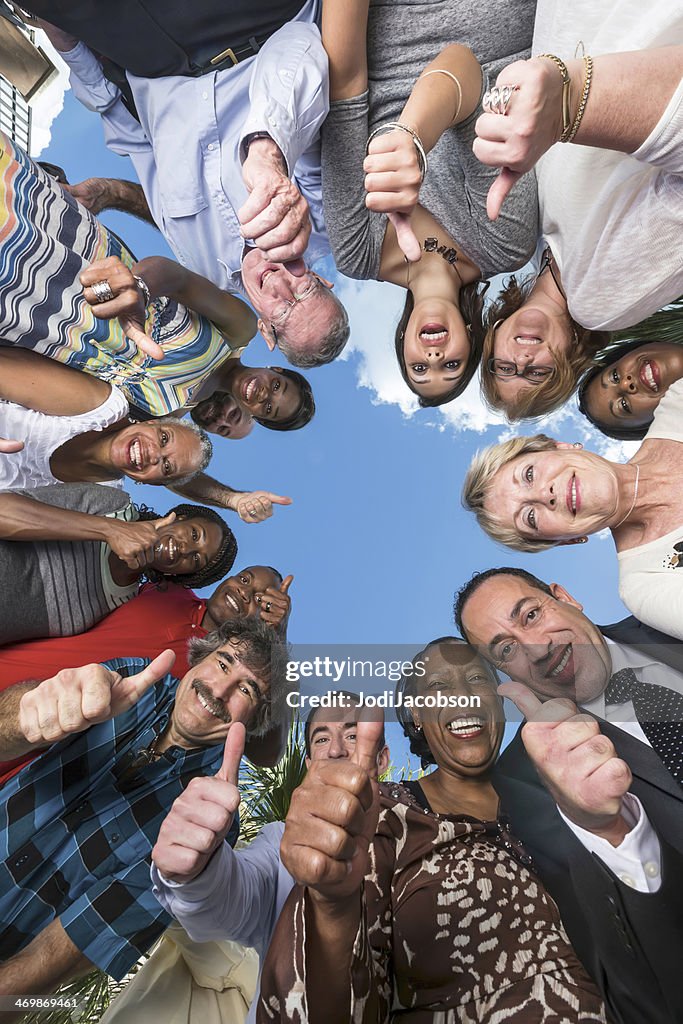 Group of Diverse Happy People thumbs up