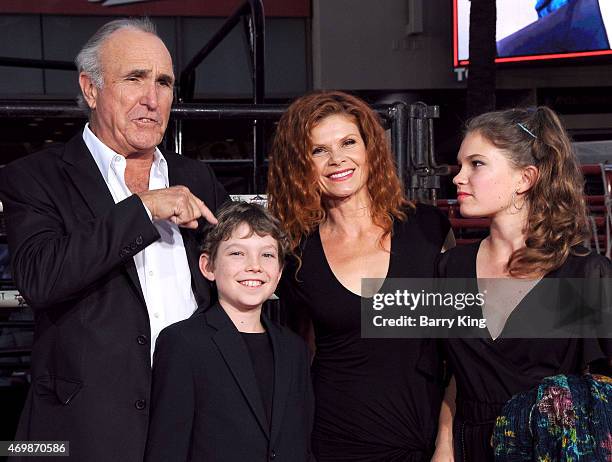 Actress Lolita Davidovich husband Ron Shelton and their children arrive at the Los Angeles Premiere 'The Longest Ride'at TCL Chinese Theatre IMAX on...