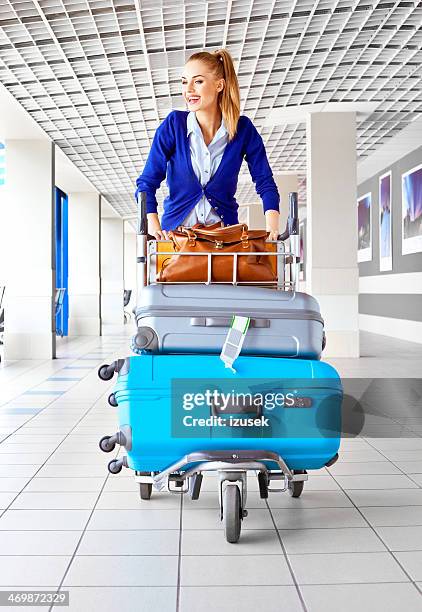 happy tourist at the airport - luggage trolley stock pictures, royalty-free photos & images