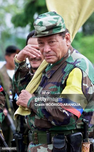 Pedro Antonio Marin, leader of the Revolutionary Armed Forces of Colombia , also known as "Manuel Marulanda" or "Tirofijo" throws a towel over his...