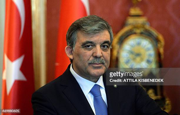 Turkey's President Abdullah Gul gives a statement with his Hungarian counterpart in the presidental palace in Budapest on February 17, 2014 during...