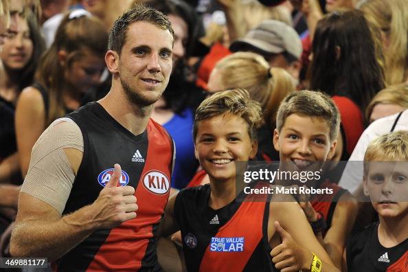 Kyle Hardingham Kyle Hardingham of the Bombers poses for a photograph with fans after ...