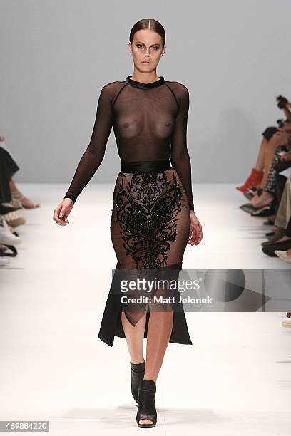 Model walks the runwaywearing Miriam Siddeq during the St George New Generation show at Mercedes-Benz Fashion Week Australia 2015 at Carriageworks on...