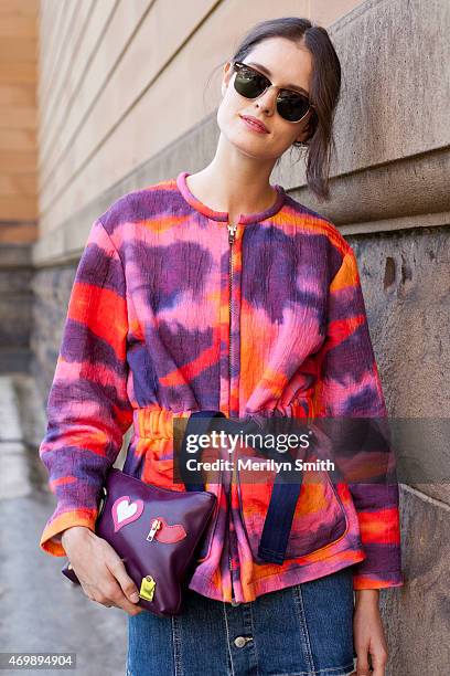 Fashion Market Editor at InStyle Magazine Chloe Hill wears an Iro jacket, AS clutch, Rayban sunglasses and Alexa Chung for AG skirt at Mercedes-Benz...