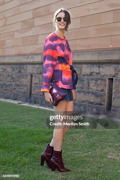 Fashion Market Editor at InStyle Magazine Chloe Hill wears an Iro jacket, Lawrence Decade shoes, AS clutch, Rayban sunglasses and Alexa Chung for AG...