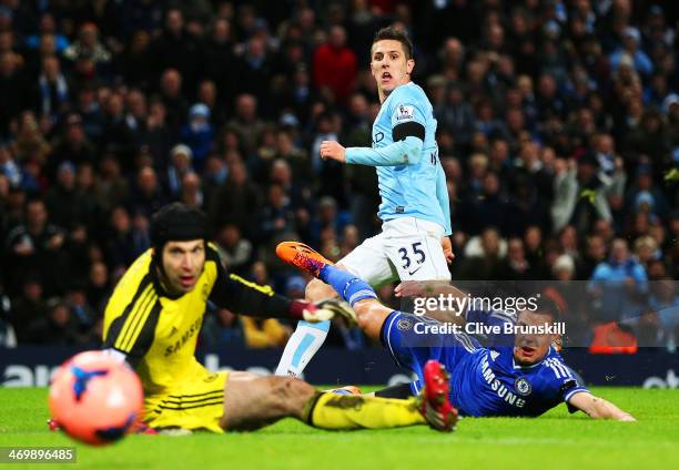 Steven Jovetic of Manchester City scores the first goal past Petr Cech of Chelsea during the FA Cup Fifth Round match sponsored by Budweiser between...