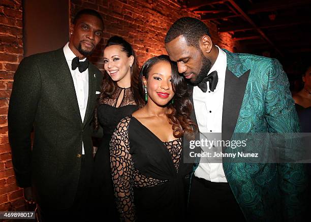 Chris Bosh, Adrienne Bosh, Savannah Brinson, and LeBron James attend GQ & LeBron James NBA All Star Party Sponsored By Samsung Galaxy And Beats at...