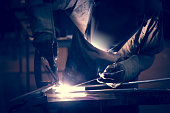 Employee welding aluminum using TIG welder.