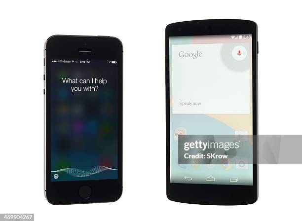 siri vs google voice commands - apple android stock pictures, royalty-free photos & images