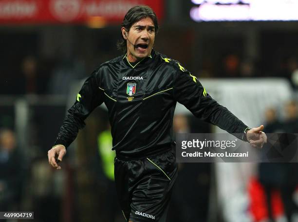 Referee Mauro Bergonzi shouts during the Serie A match between AC Milan and Bologna FC at San Siro Stadium on February 14, 2014 in Milan, Italy.