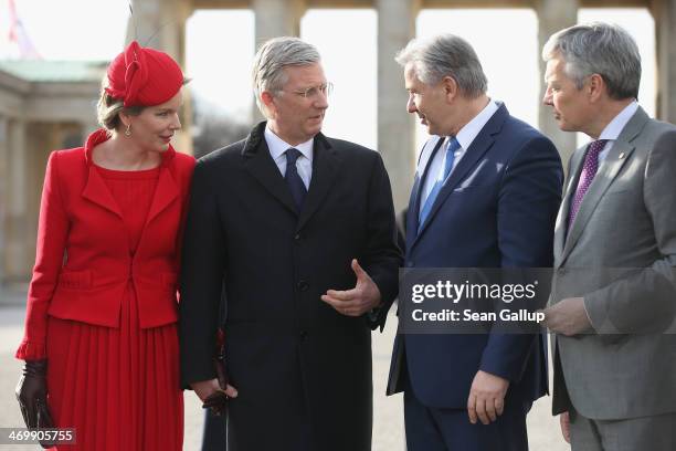 Queen Mathilde of Belgium, King Philippe of Belgium, Berlin Mayor Klaus Wowereit and Belgian Foreign Minister Didier Reynders stand in front of the...