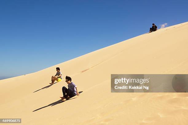 stockton beach - sandboarding - port stephens stock pictures, royalty-free photos & images