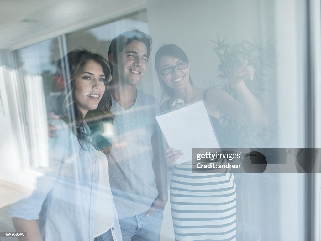 Young couple buying a house