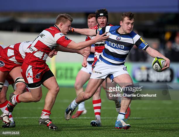 Elliot Herrod-Taylor of Bath attacks during the The U18 Academy Finals Day match between Bath and Gloucester at Allianz Park on February 17, 2014 in...