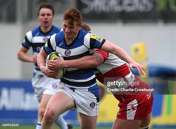 Rory Jennings of Bath attacks during the The U18 Academy Finals Day match between Bath and Gloucester at Allianz Park on February 17, 2014 in Barnet,...