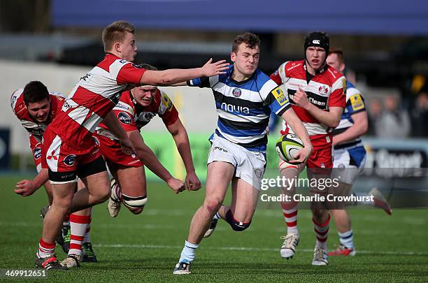 Elliot Herrod-Taylor of Bath attacks during the The U18 Academy Finals Day match between Bath and Gloucester at Allianz Park on February 17, 2014 in...