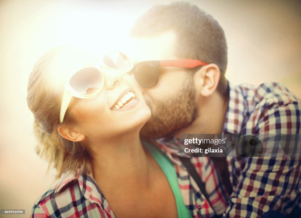 Young couple kissing.