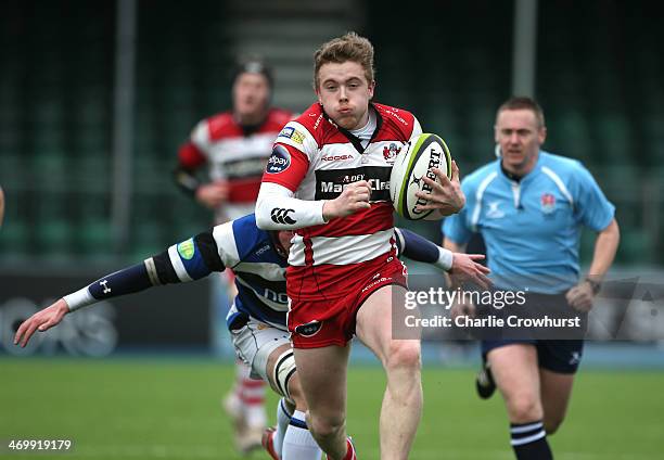 Elliot Creed of Gloucester attacks during the The U18 Academy Finals Day match between Bath and Gloucester at Allianz Park on February 17, 2014 in...