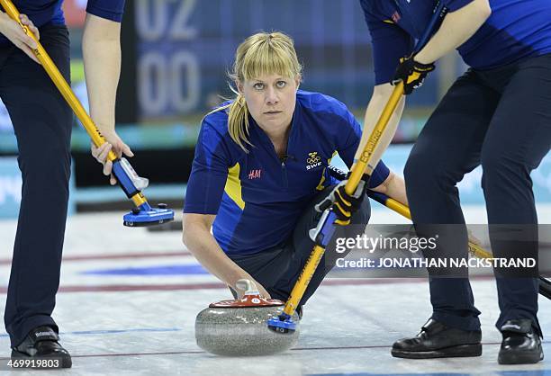 Sweden's Maria Prytz throws a stone during the Women's Curling Round Robin Session 12 against Japan at the Ice Cube Curling Center during the Sochi...