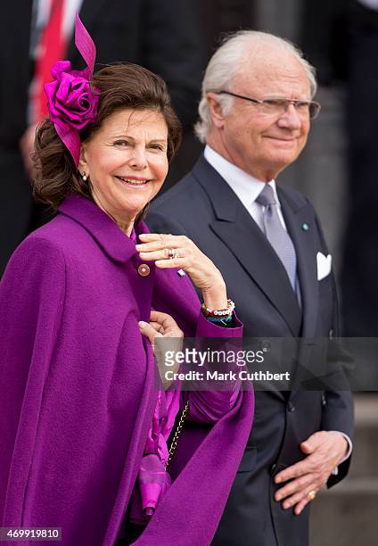 King Carl XVI Gustaf of Sweden and Queen Silvia of Sweden leave the Town Hall after lunch during festivities for the 75th birthday of Queen Margrethe...