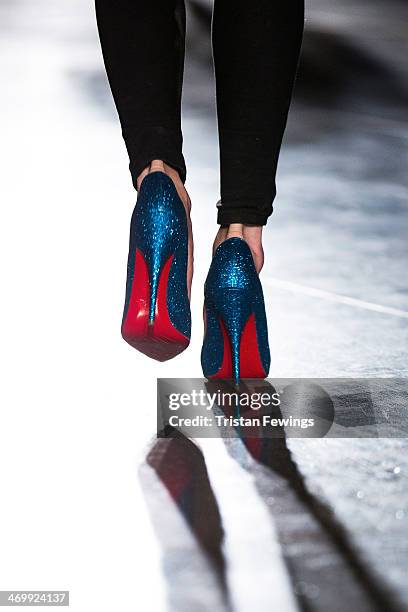 Model wears Louboutin shoes at the Johnathan Saunders show during London Fashion Week AW14 at Tate Britian on February 16, 2014 in London, England.