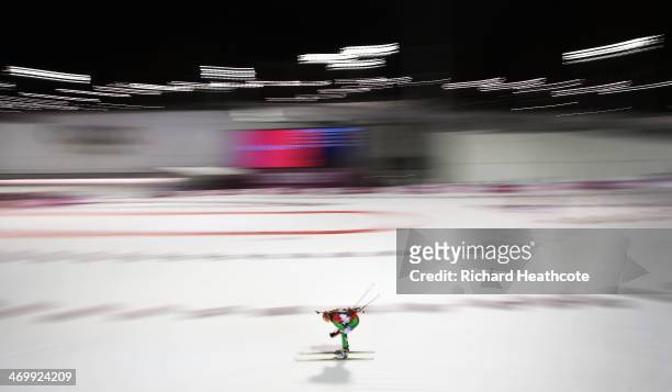 Darya Domracheva of Belarus competes in the Women's 12.5 km Mass Start during day ten of the Sochi 2014 Winter Olympics at Laura Cross-country Ski &...