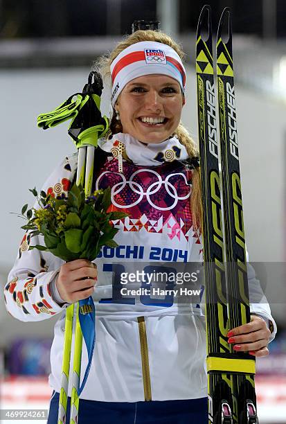 Silver medalist Gabriela Soukalova of the Czech Republic celebrates during the flower ceremony for the Women's 12.5 km Mass Start during day ten of...