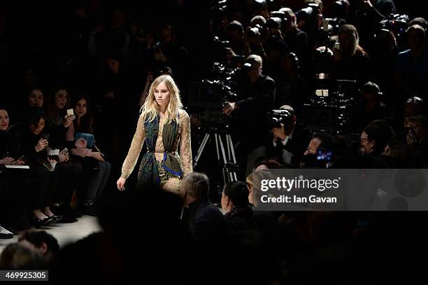 Model Suki Waterhouse walks the runway at Burberry Womenswear Autumn/Winter 2014 at Kensington Gardens on February 17, 2014 in London, England.