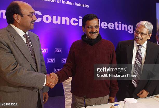Leader Arvind Kejriwal with CII President S Gopalakrishnan and President Designate, CII, Ajay S Sriram at CII National Council meeting at Hotel Taj...