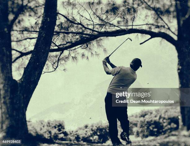 Thomas Aiken of South Africa hits his second shot on the 1st hole during Final Day of the Africa Open at East London Golf Club on February 16, 2014...