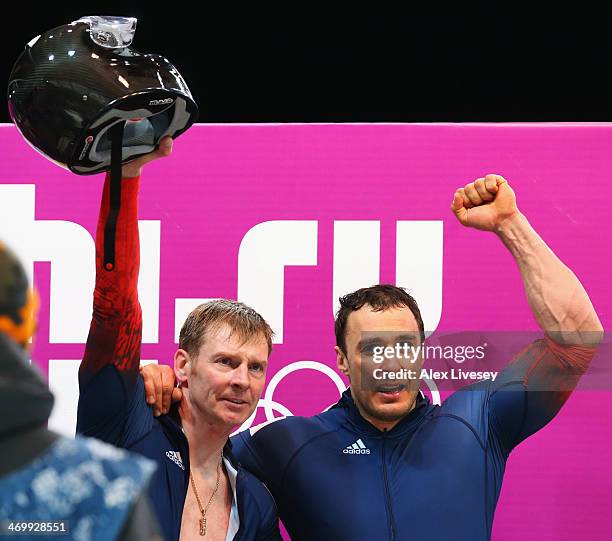 Pilot Alexander Zubkov and Alexey Voevoda of Russia team 1 celebrate winning gold during the Men's Two-Man Bobsleigh on Day 10 of the Sochi 2014...