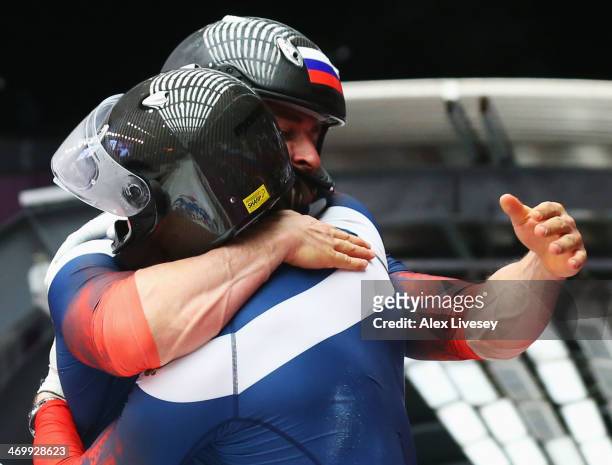 Pilot Alexander Zubkov and Alexey Voevoda of Russia team 1 celebrate winning gold during the Men's Two-Man Bobsleigh on Day 10 of the Sochi 2014...