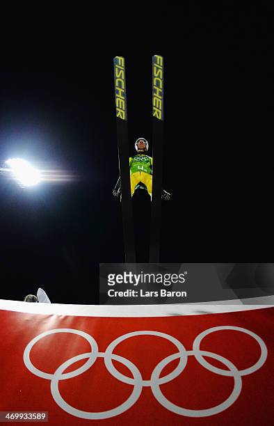 Alexey Romashov of Russia jumps during the Men's Team Ski Jumping trial on day 10 of the Sochi 2014 Winter Olympics at the RusSki Gorki Ski Jumping...