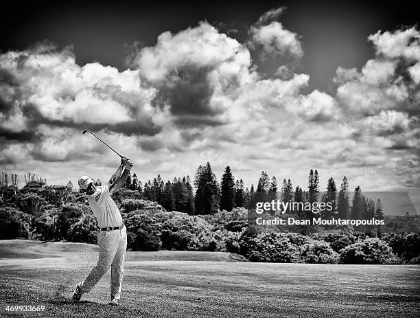 Richard Bland of England hits his second shot on the 1st hole during the Final Round of the Africa Open at East London Golf Club on February 16, 2014...