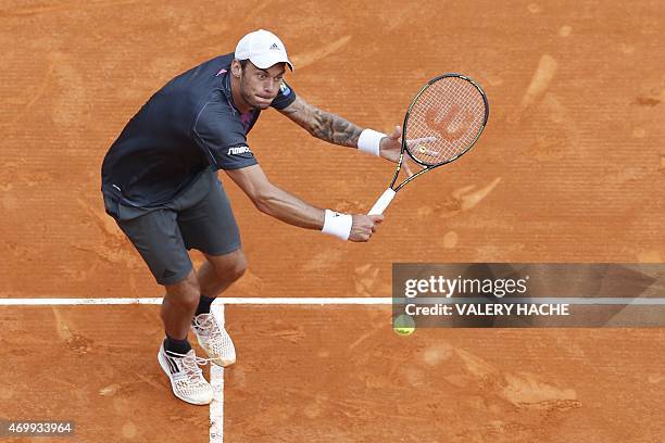 Austrian player Andreas Haider Maurer returns the ball to Serbian player Novak Djokovic during the Monte-Carlo ATP Masters Series Tournament tennis...