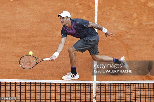 Austrian player Andreas Haider Maurer returns the ball to Serbian player Novak Djokovic during the Monte-Carlo ATP Masters Series Tournament tennis...