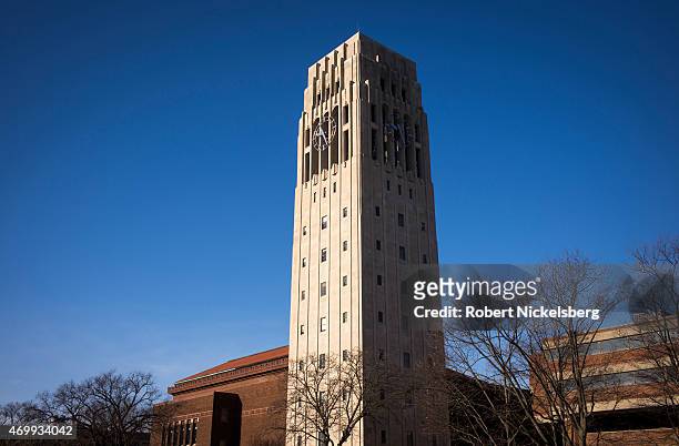 The Burton Memorial Tower stands on the central campus March 24, 2015 at the University of Michigan in Ann Arbor, Michigan. Built in 1936, the 120'...