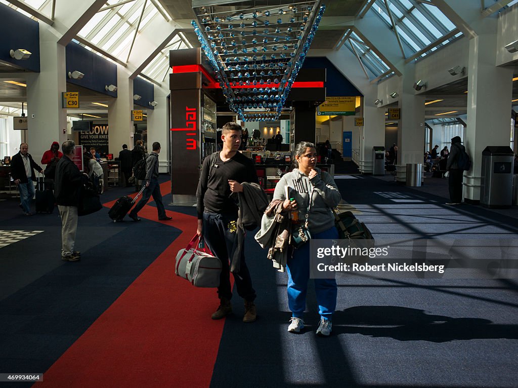 US Airways Passengers At New York's LaGuardia Airport