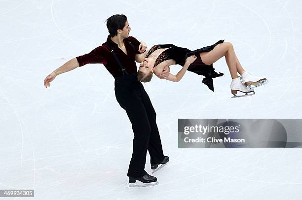 Kaitlyn Weaver and Andrew Poje of Canada compete in the Figure Skating Ice Dance Free Dance on Day 10 of the Sochi 2014 Winter Olympics at Iceberg...