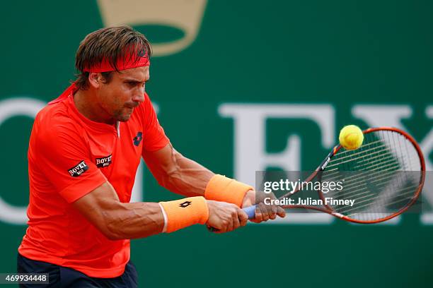 David Ferrer of Spain in action against Gilles Simon of France during day five of the Monte Carlo Rolex Masters tennis at the Monte-Carlo Sporting...