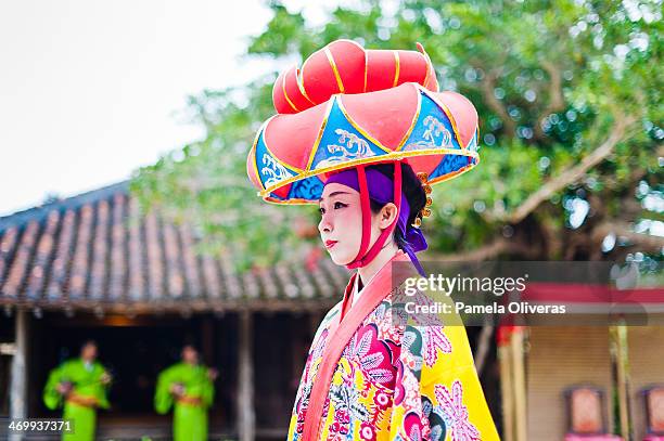 ryukyu lady in a hat - okinawa prefecture stock pictures, royalty-free photos & images