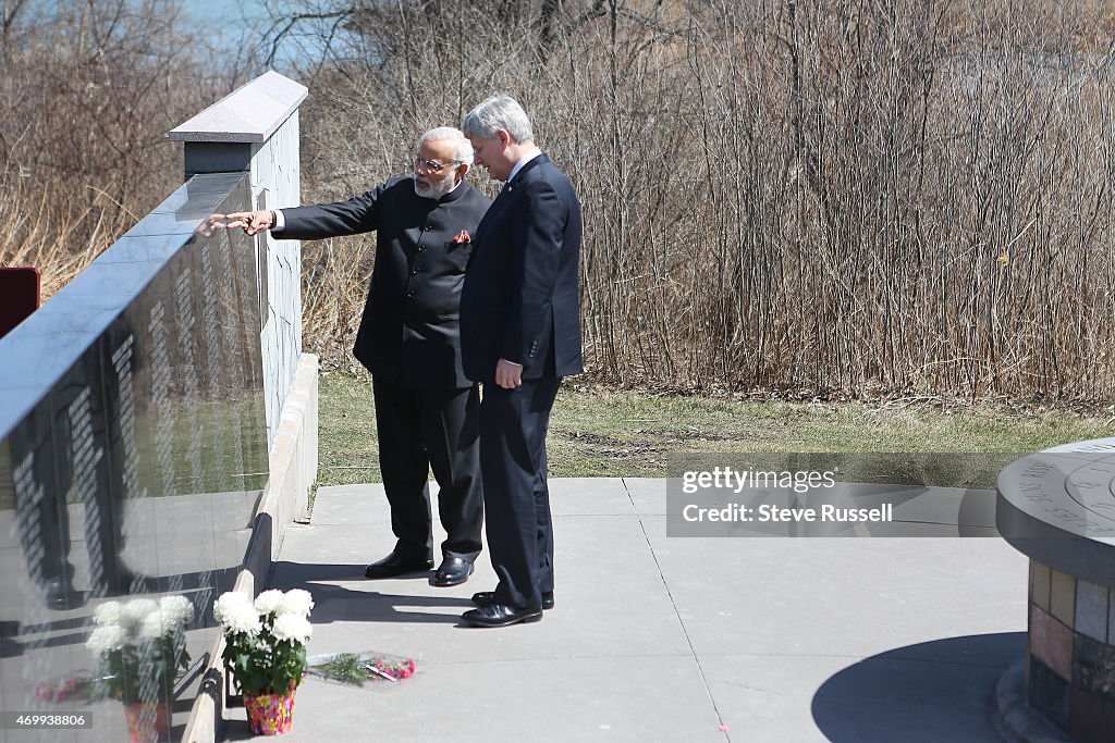 Indian Prime Minister Narendra Modi visits the Air India monument at Humber Bay East Park with Prime Minister Stephen Harper