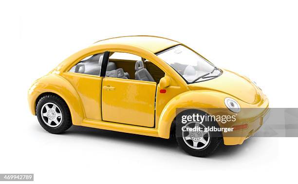 yellow toy car - beetle isolated stock pictures, royalty-free photos & images