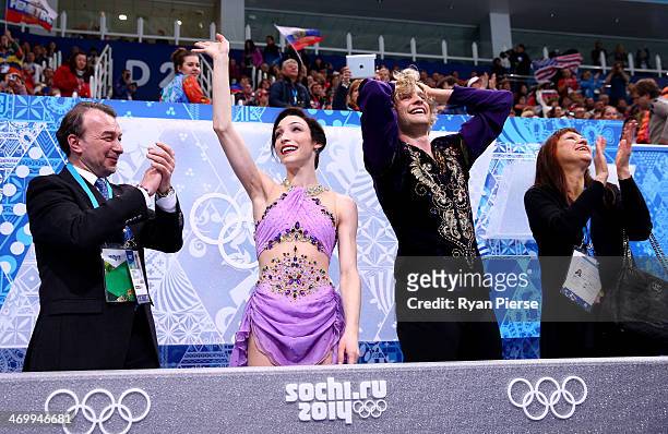Meryl Davis and Charlie White of the United States celebrate the gold medal with their coaches Oleg Epstein and Marina Zoueva in the Figure Skating...