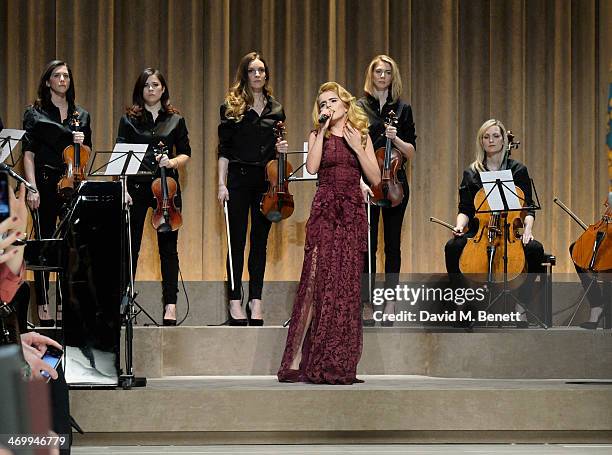 Paloma Faith performs at Burberry Womenswear Autumn/Winter 2014 at Kensington Gardens on February 17, 2014 in London, England.