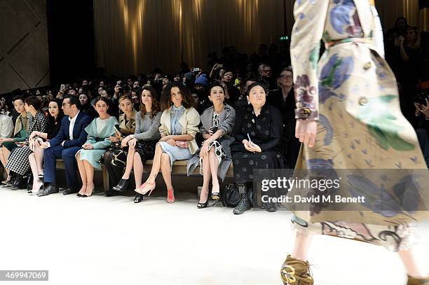 Mohammed al Turki, Mira Duma, guest, Beren Saat, Kangana Ranaut and Carina Lau sit in the front row at Burberry Womenswear Autumn/Winter 2014 at...