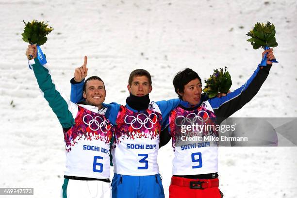 Silver medalist David Morris of Australia, gold medalist Anton Kushnir of Belarus and bronze medalist Jia Zongyang of China celebrate on the podium...