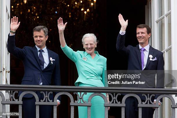Queen Margrethe II of Denmark, and her sons Crown Prince Frederik of Denmark and Prince Joachim of Denmark appear on the Balcony of Amalienborg...