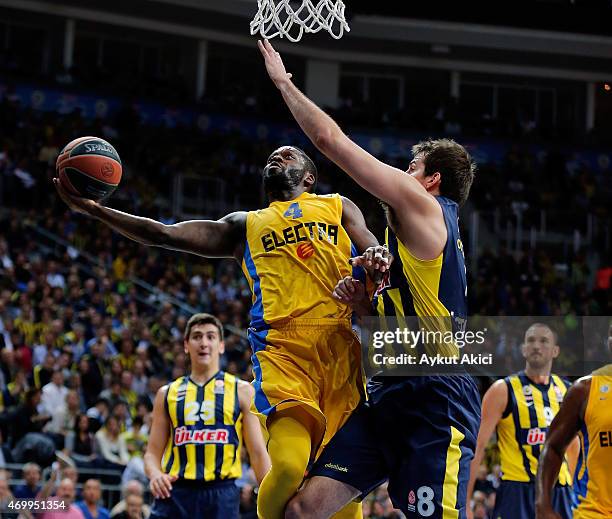 Jeremy Pargo, #4 of Maccabi Electra Tel Aviv competes with Nemanja Bjelica, #8 of Fenerbahce Ulker Istanbul during the 2014-2015 Turkish Airlines...