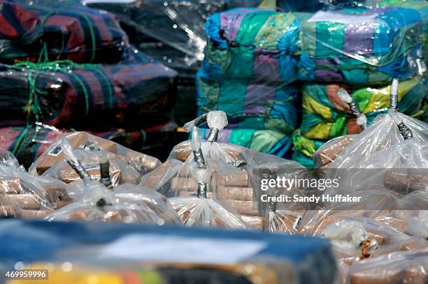 Bails of cocaine confiscated at sea by Coast Guard personel while on deployment on April 16, 2015 at Naval Base San Diego in San Diego, California....